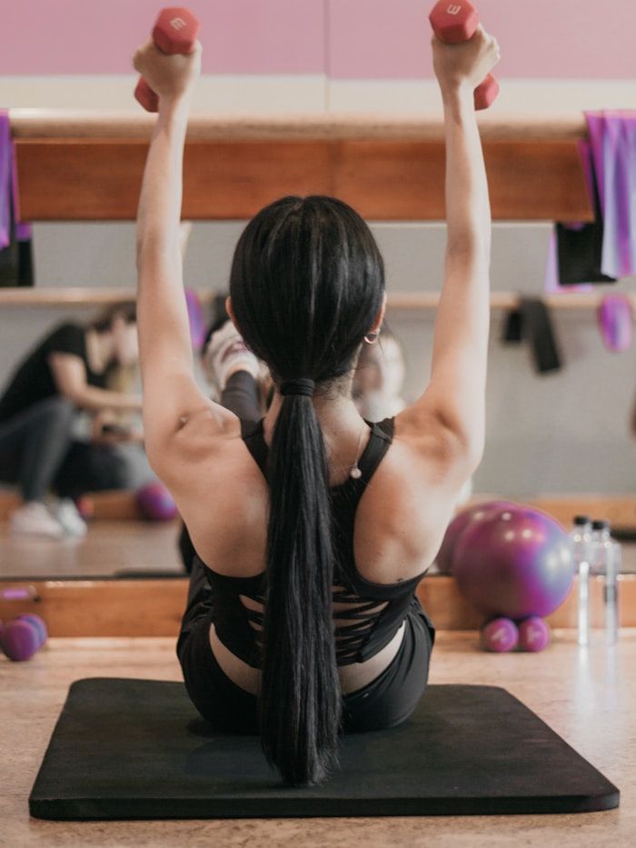 Member Priya during a mobility and stretching session