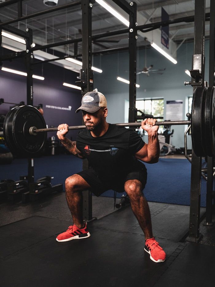 Member Tom working through a squat set